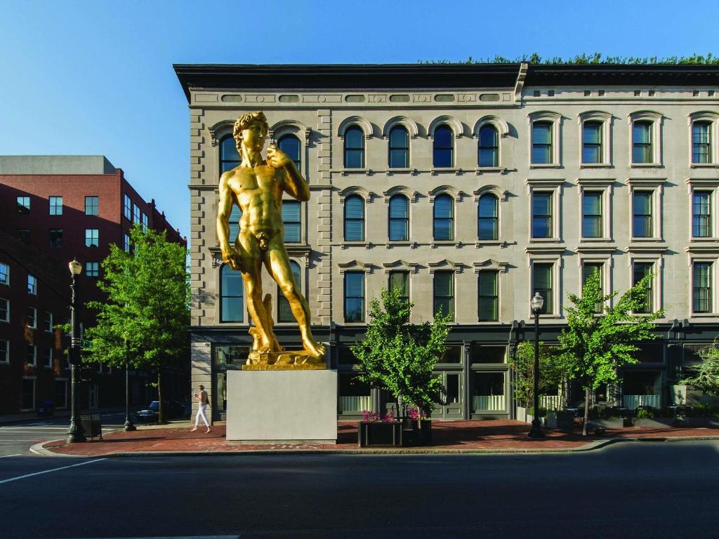 Gilded David statue on the sidewalk outside 21c Museum Hotel, Louisville, Kentucky