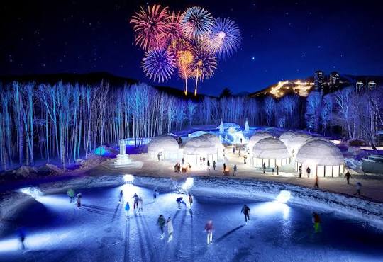Illuminated ice domes and skating rink at Ice Village, Tomamu, Hokkaido